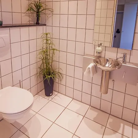 Architektenhaus Am Pewsumer Tief Holiday home Krummhoern